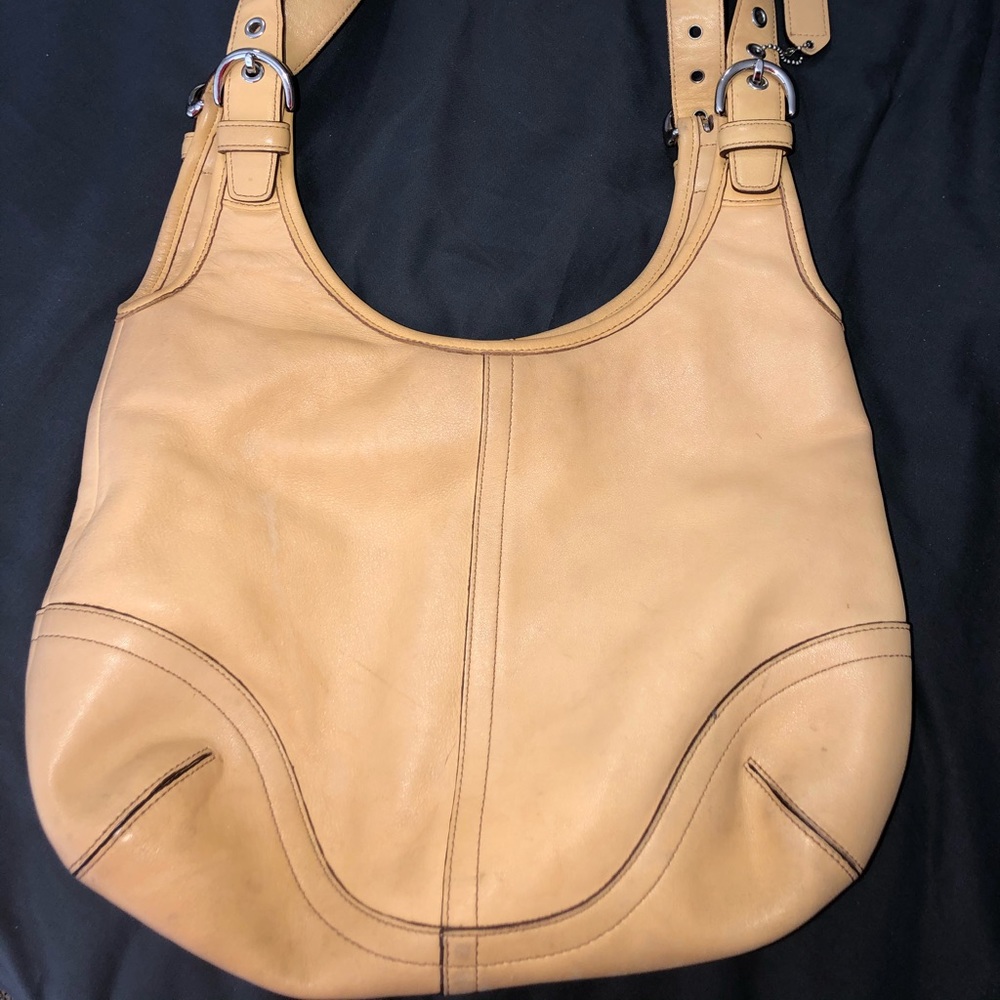 Tan/yellowish Authentic coach bag. Used condition.
